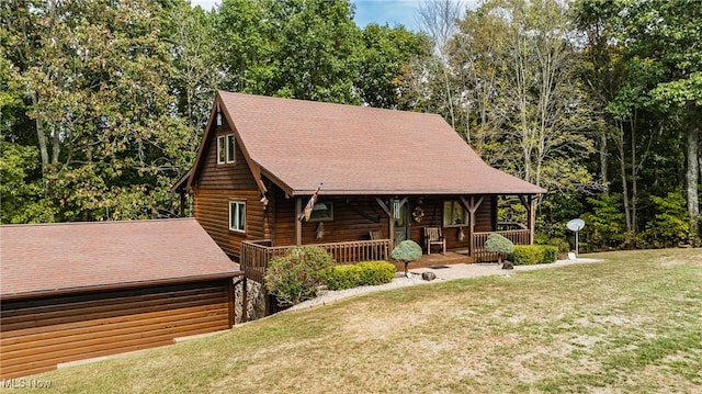 view of front facade with a front lawn and a porch