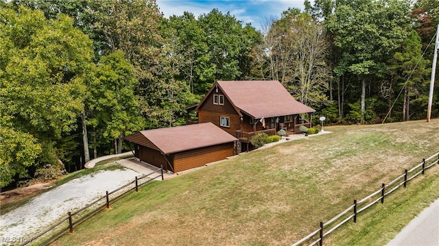 exterior space with a front yard and a porch