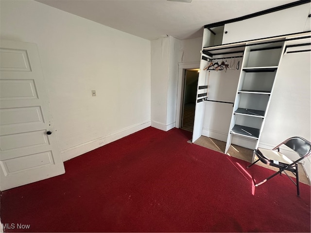 unfurnished bedroom with light carpet