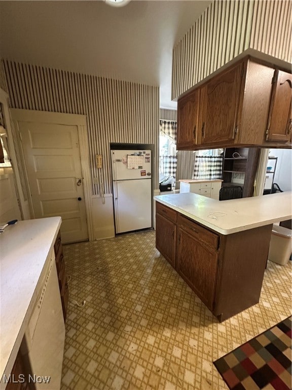 kitchen featuring white refrigerator