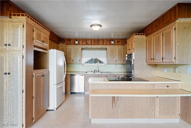 kitchen with black electric cooktop, a kitchen breakfast bar, kitchen peninsula, white fridge, and stainless steel dishwasher