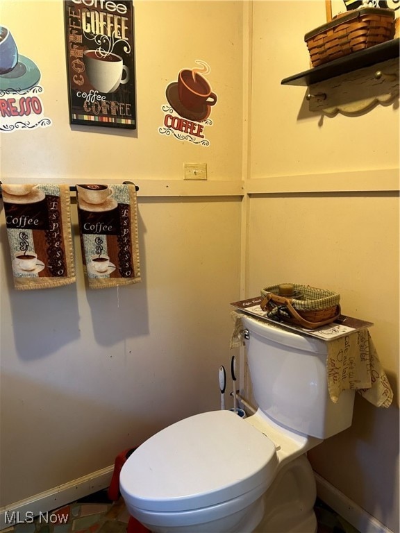 bathroom featuring toilet