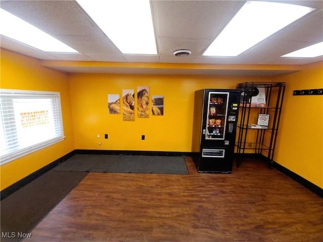 empty room with dark hardwood / wood-style floors