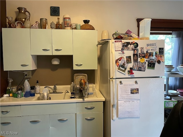 kitchen with white fridge and sink