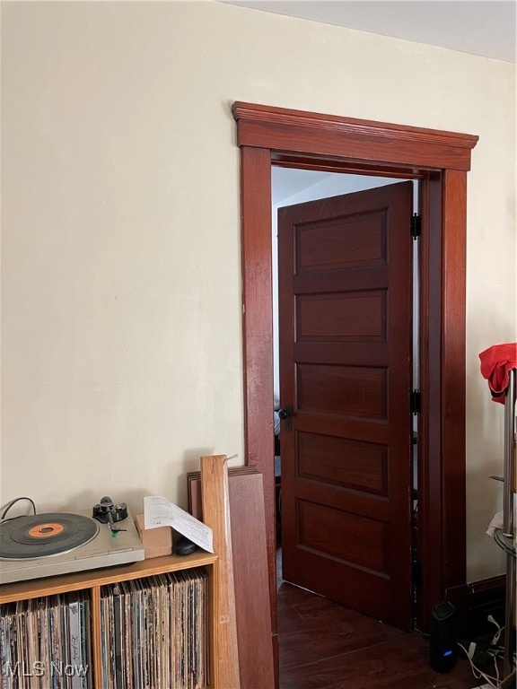 entryway with dark wood-type flooring