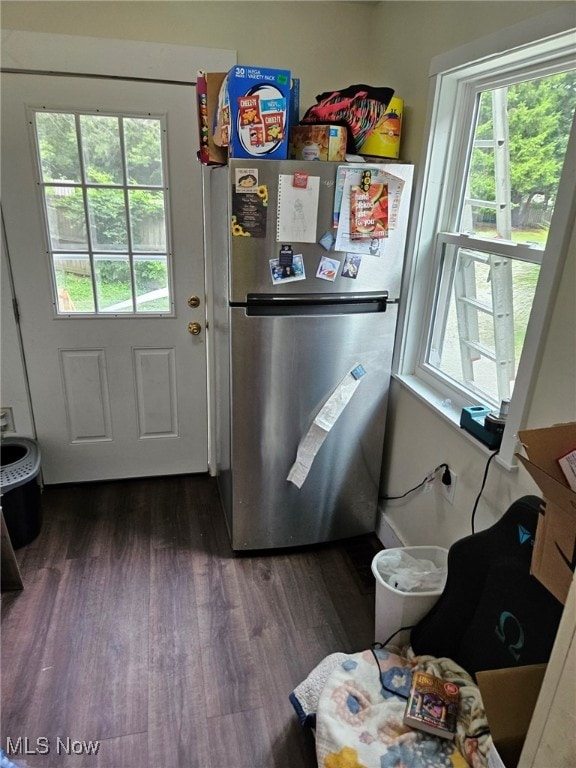 interior space with dark hardwood / wood-style flooring