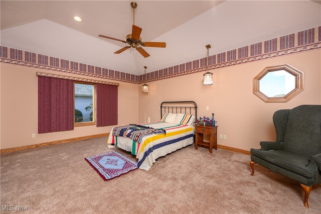 carpeted bedroom featuring lofted ceiling and ceiling fan