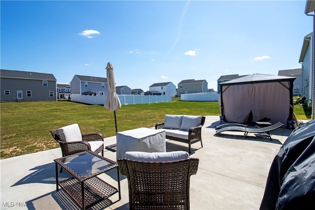 view of patio with outdoor lounge area and a gazebo