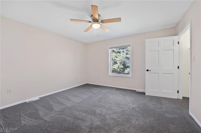 carpeted empty room with ceiling fan