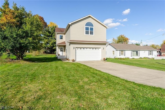 view of property featuring a garage and a front lawn