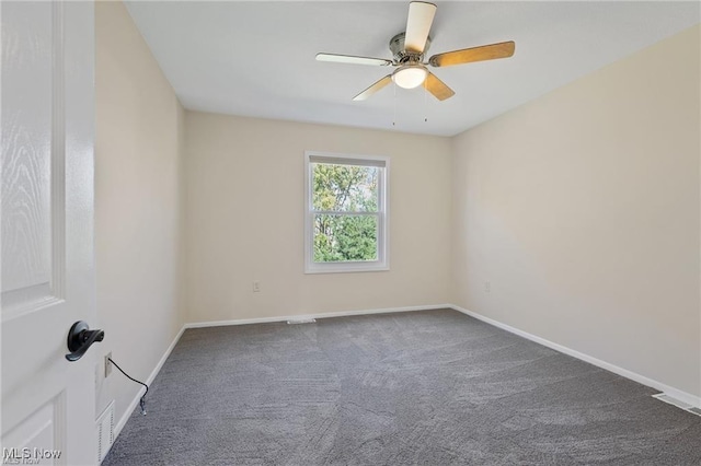 carpeted empty room with ceiling fan