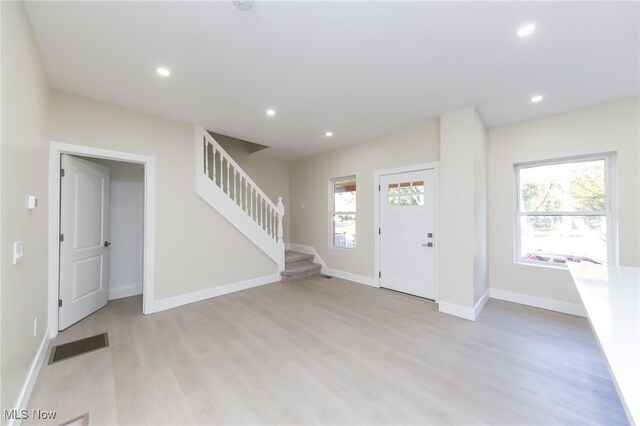 entryway with light wood-type flooring