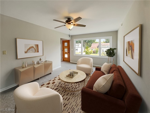 living room with ceiling fan and light colored carpet