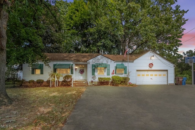 ranch-style home with a garage