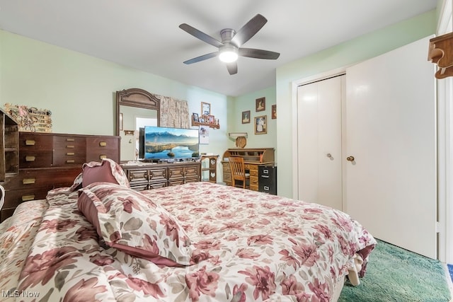 carpeted bedroom featuring a closet and ceiling fan