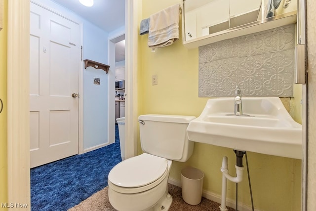 bathroom featuring toilet