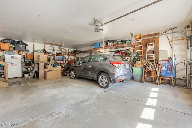 garage featuring a garage door opener