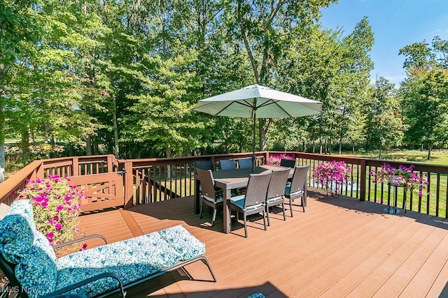 deck with outdoor dining area