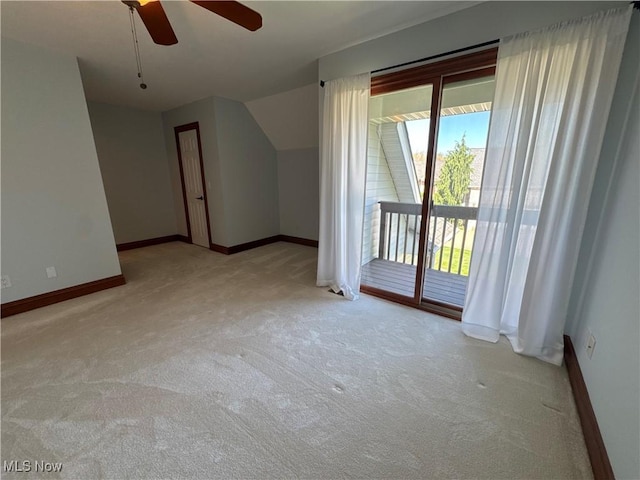 bonus room with baseboards, plenty of natural light, and carpet flooring