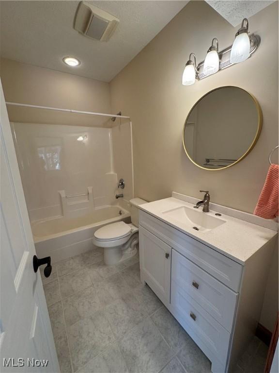 full bath featuring tile patterned flooring, vanity, shower / bathtub combination, toilet, and visible vents