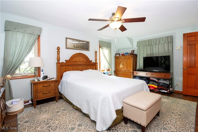 bedroom featuring light wood-type flooring and ceiling fan