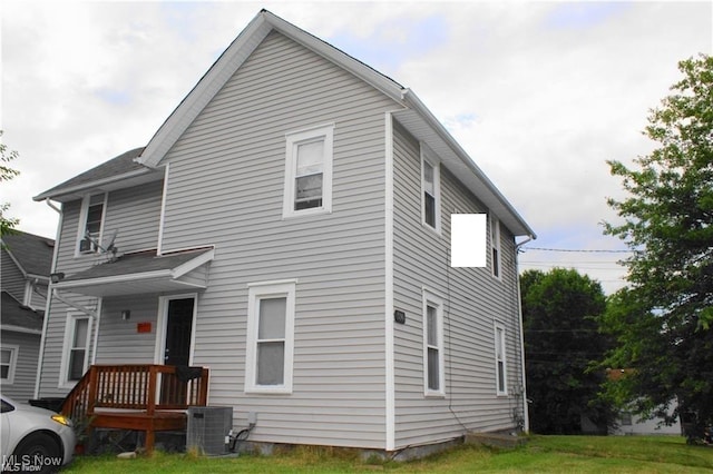 view of front of house featuring central AC