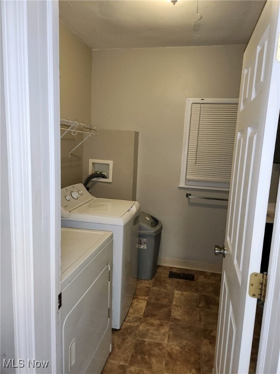 laundry area with washer and dryer