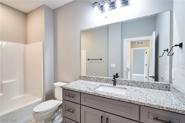 full bathroom featuring shower / bathtub combination, vanity, and toilet