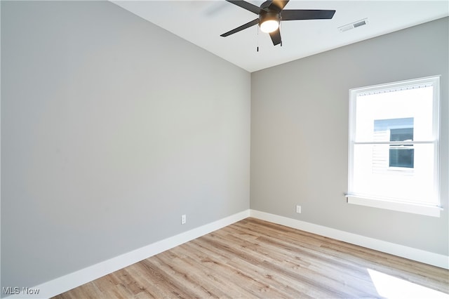 unfurnished room with ceiling fan and light hardwood / wood-style flooring