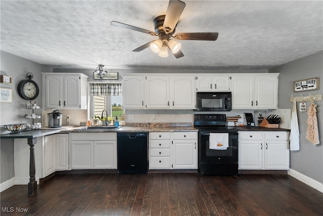 kitchen featuring white cabinets, dark hardwood / wood-style floors, sink, and black appliances