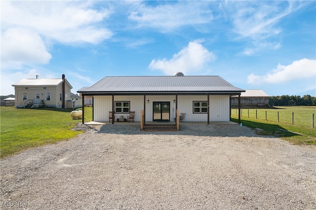 exterior space with a front lawn and covered porch