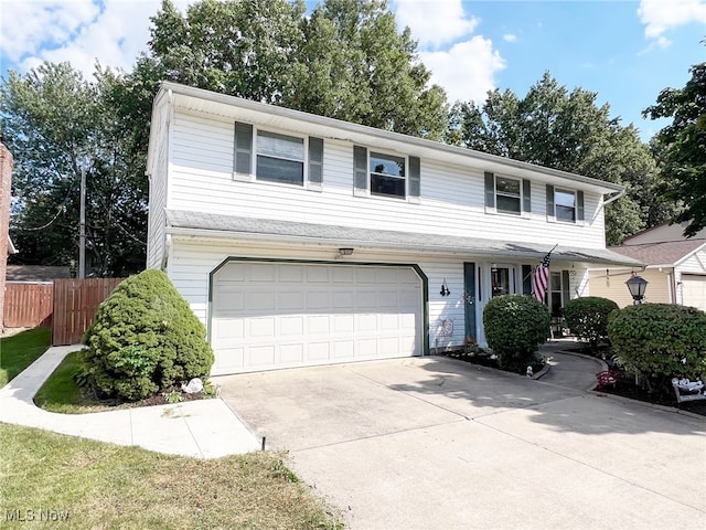 view of front of property featuring a garage