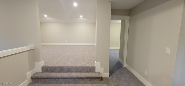 stairway with carpet flooring