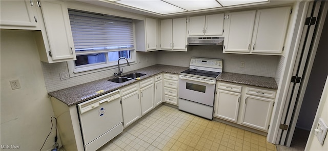 kitchen with dishwasher, white cabinetry, stove, and sink