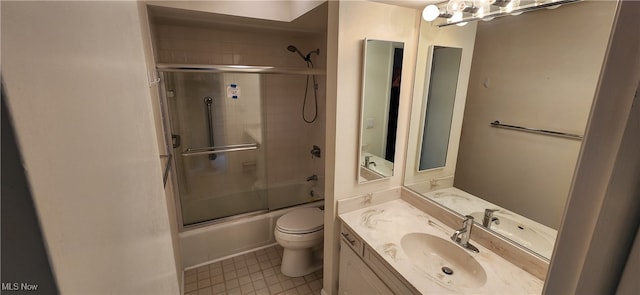 full bathroom with shower / bath combination with glass door, vanity, and toilet