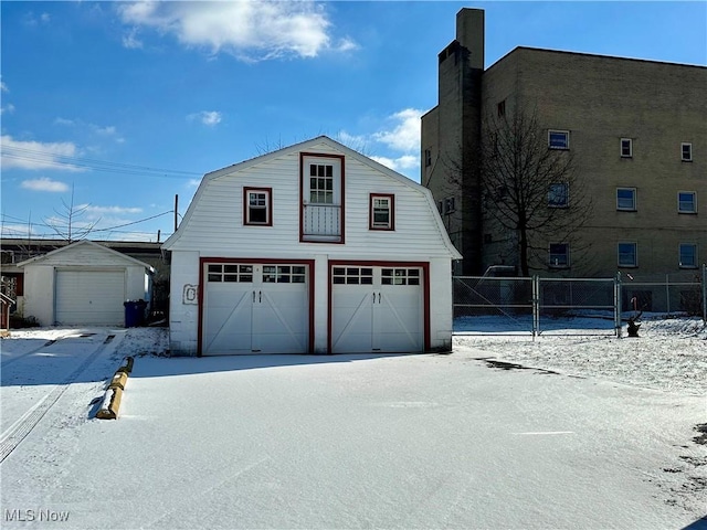 view of snow covered garage