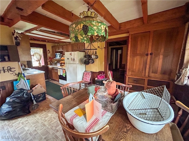 living room featuring beamed ceiling