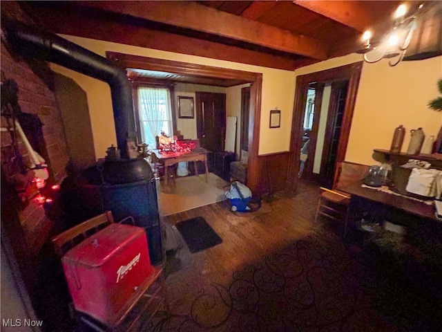 interior space featuring beamed ceiling and wood ceiling