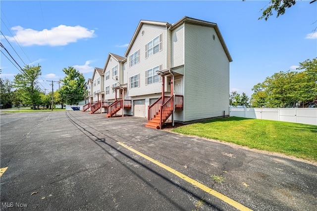 exterior space with a front lawn