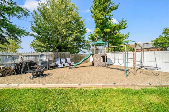 view of playground with a lawn