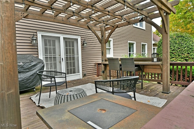 view of patio with a pergola and a deck