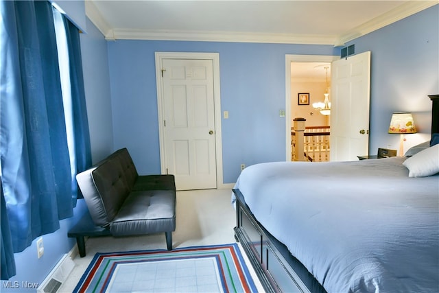 carpeted bedroom featuring crown molding and a chandelier