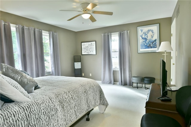 bedroom featuring ceiling fan and carpet flooring