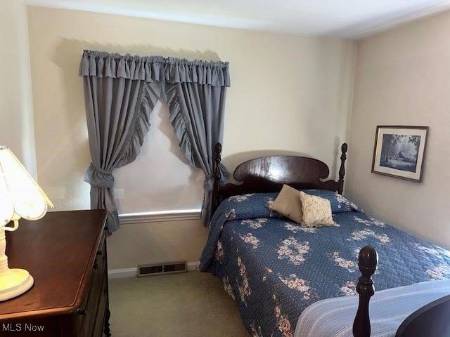 bedroom featuring carpet flooring