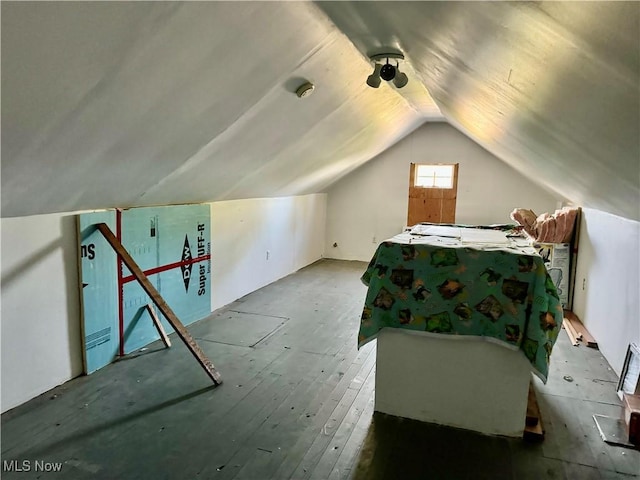 bonus room featuring vaulted ceiling