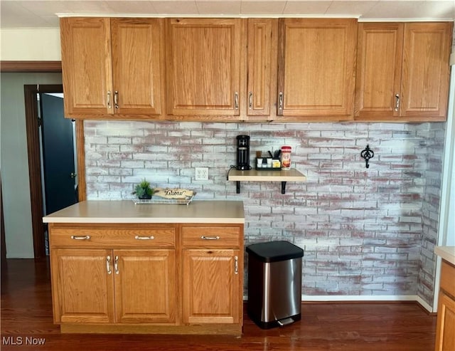 kitchen with dark wood-type flooring