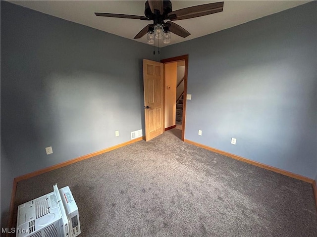 7836 Oak St, Masury, OH 44438 - unfurnished room with carpet floors, visible vents, baseboards, and ceiling fan