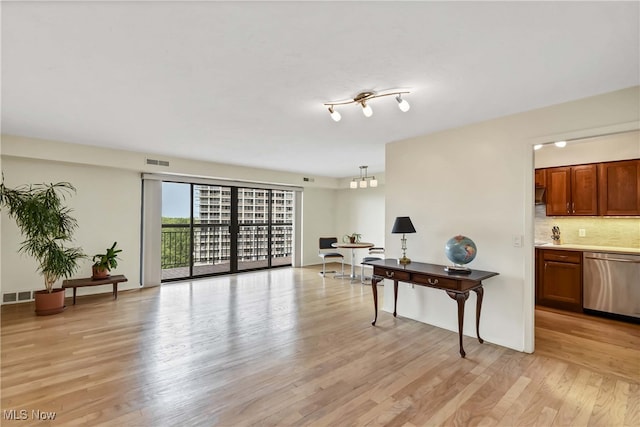 living room with light hardwood / wood-style flooring