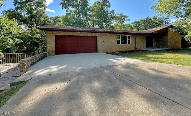 single story home with a garage