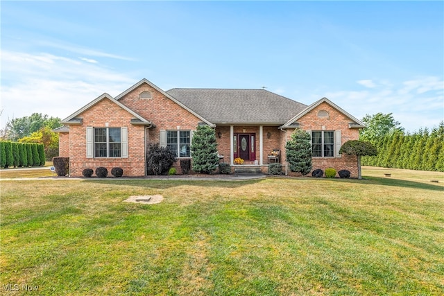 ranch-style home with a front lawn